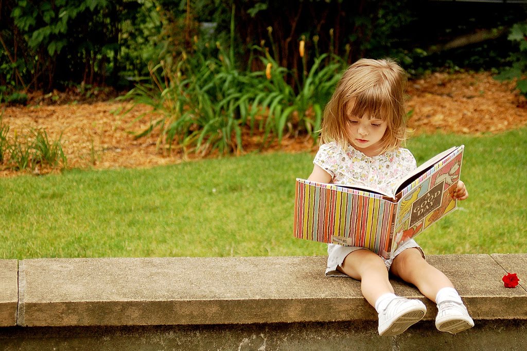 little girl reading