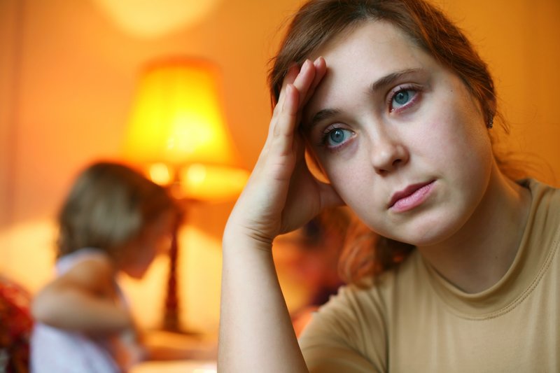 An-image-of-a-tired-woman-and-a-child_converted