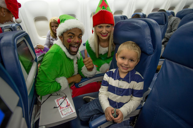 on board a Delta flight to the North Pole during the North Pole Fantasy flight at Hartsfield Jackson International Airport on Saturday December 5, 2015. ©2015 Chris Rank/ Rank Studios