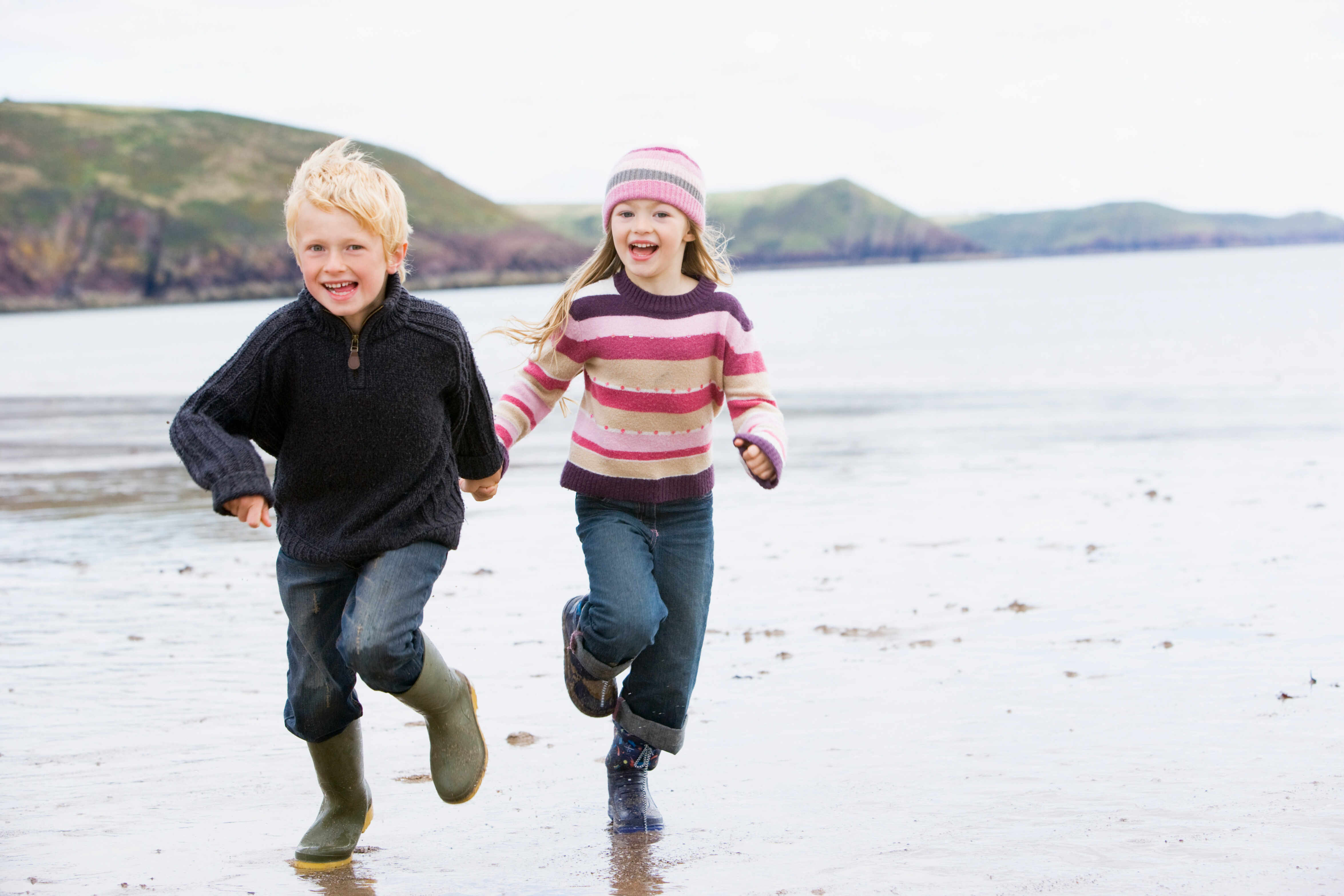 children-running-on-beach